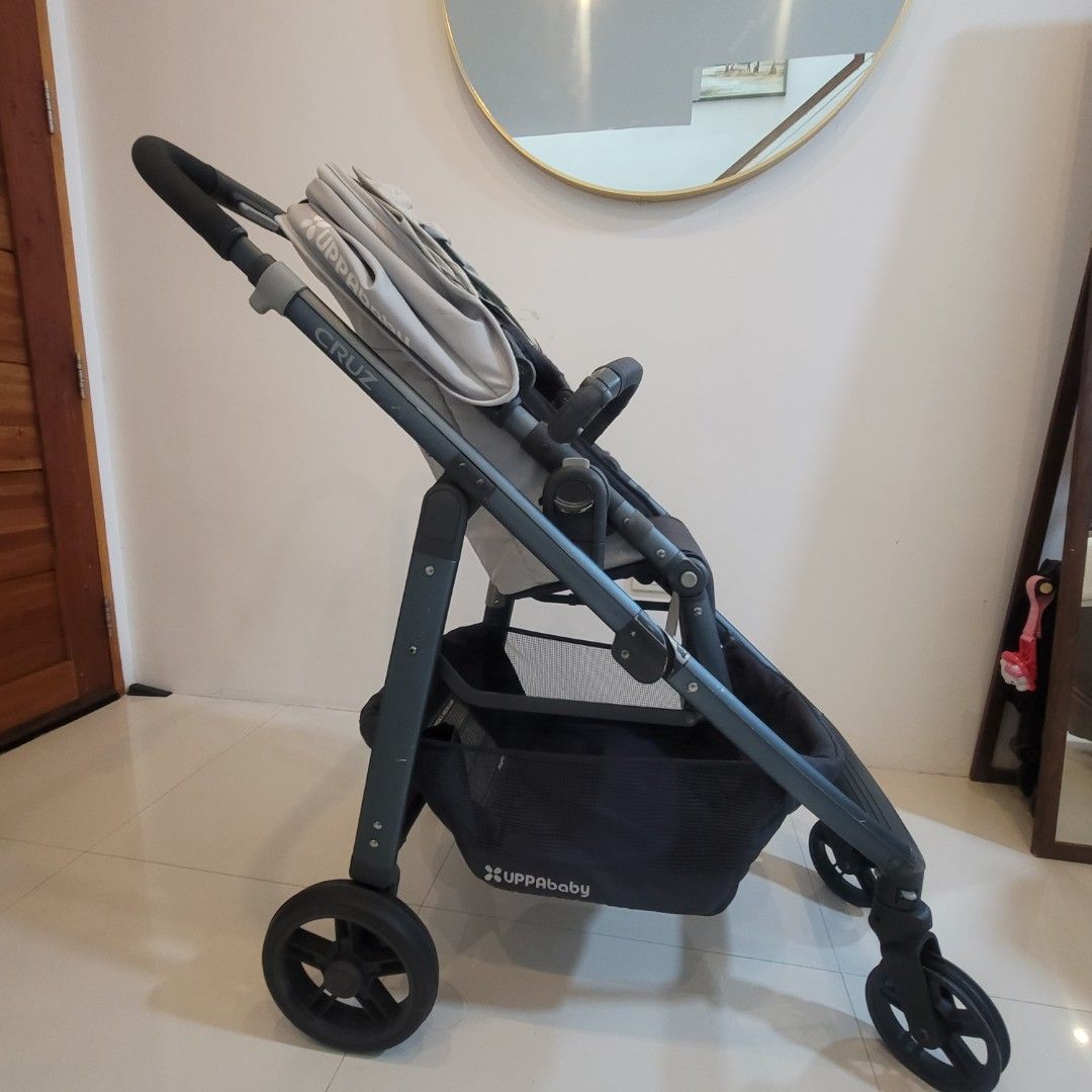 UppaBaby Cruz Stroller (Category: Strollers) located in Muntinlupa City. Submitted by graciehart_08-99793 (Listing ID 1431245442, Image 2). Description: Uppababy Cruz Stroller -brandnew front wheels -Retails at $700++ - Travel system ready -Multiposition recline -Reversible seat -One step fold Others: extended canopy (UV50+), big basket, smooth ride, great durability -https://youtu.be/q3JjPND66LA?si=7IECNGtuiE8TcLdD Specifications: Unfolded: 22.2