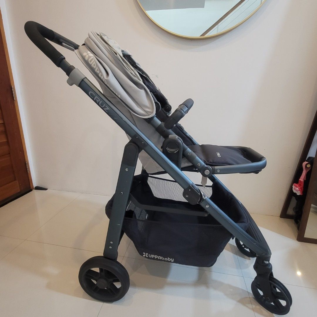 UppaBaby Cruz Stroller (Category: Strollers) located in Muntinlupa City. Submitted by graciehart_08-99793 (Listing ID 1431245442, Image 3). Description: Uppababy Cruz Stroller -brandnew front wheels -Retails at $700++ - Travel system ready -Multiposition recline -Reversible seat -One step fold Others: extended canopy (UV50+), big basket, smooth ride, great durability -https://youtu.be/q3JjPND66LA?si=7IECNGtuiE8TcLdD Specifications: Unfolded: 22.2