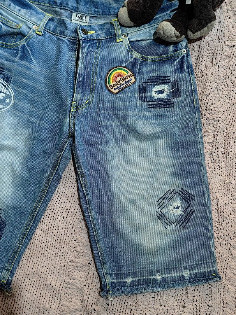 Y2K Body Glove Surf Short Denim Jeans (Category: Shorts) located in Tuguegarao City. Submitted by ekko_bag2 (Listing ID 1431253843, Image 2). Description: In very good condition - Distressed design -very good Embroidered patches -Dated 2008 Dimension in inches L x W - 23 x 34(waistline) Leg opening - 9.5 Mode of payment - Gcash Payment first, No COD Shipping thru JNT (next day shipping) ***Please manage your expectations as this is a thrifted aut
