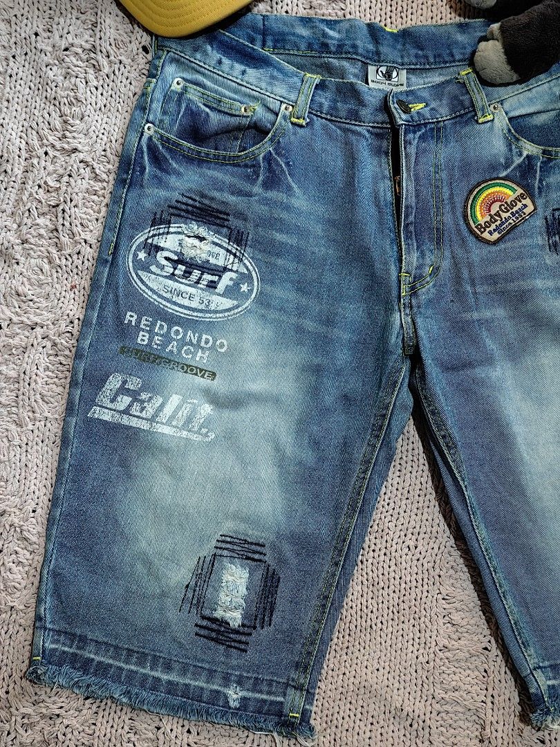 Y2K Body Glove Surf Short Denim Jeans (Category: Shorts) located in Tuguegarao City. Submitted by ekko_bag2 (Listing ID 1431253843, Image 3). Description: In very good condition - Distressed design -very good Embroidered patches -Dated 2008 Dimension in inches L x W - 23 x 34(waistline) Leg opening - 9.5 Mode of payment - Gcash Payment first, No COD Shipping thru JNT (next day shipping) ***Please manage your expectations as this is a thrifted aut
