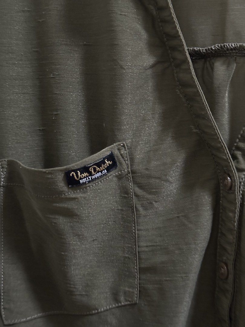 Vondutch Army Green See Through Long Sleeves Button Down Top (Category: Longsleeves) located in Quezon City. Submitted by katdeclutters (Listing ID 1431355920, Image 3). Description: Small Length - 27" Width - 20" For reference: height - 150cm / 4'11" bust - 34B waist - 24-25" hips - 34" 📍QC.