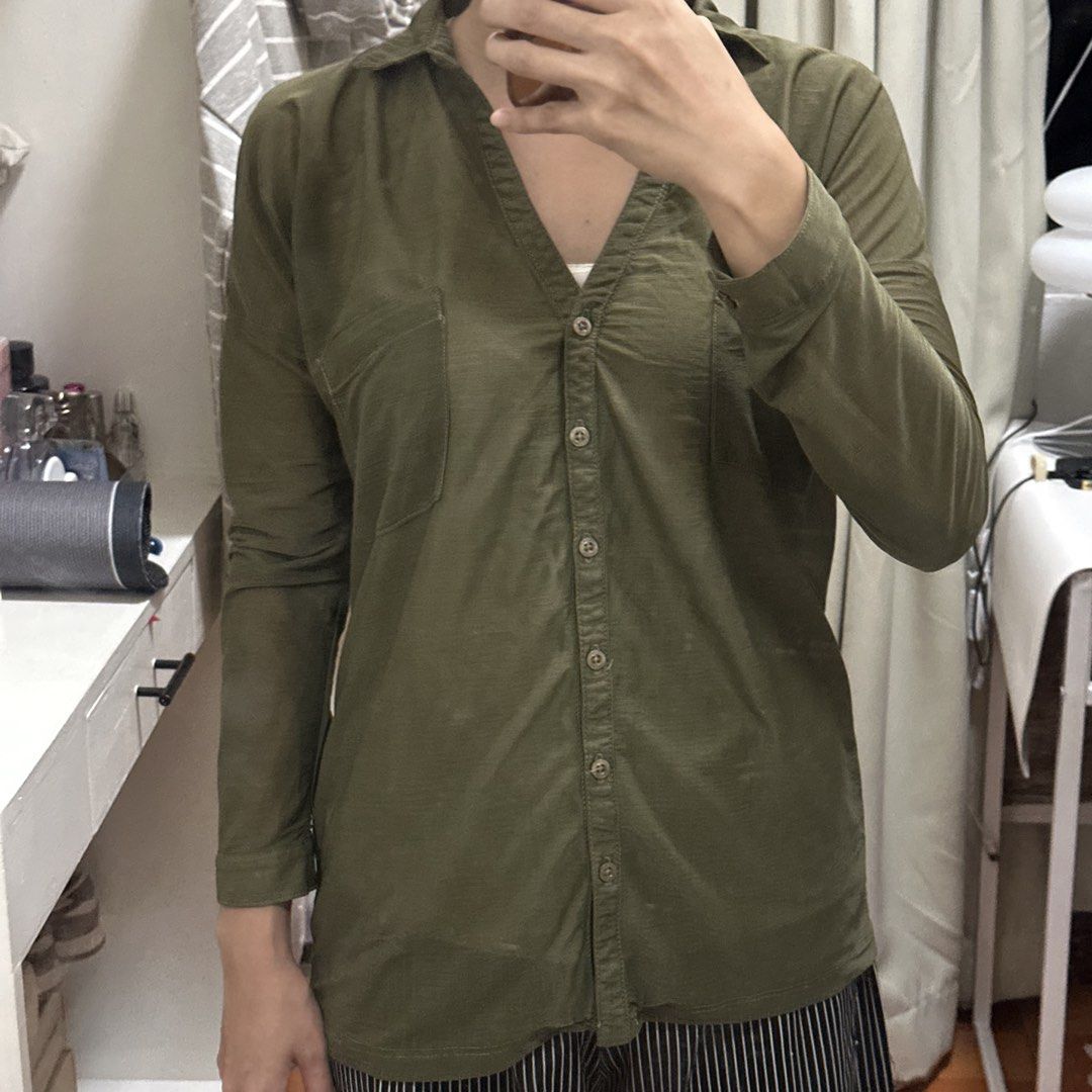 Vondutch Army Green See Through Long Sleeves Button Down Top (Category: Longsleeves) located in Quezon City. Submitted by katdeclutters (Listing ID 1431355920, Image 1). Description: Small Length - 27" Width - 20" For reference: height - 150cm / 4'11" bust - 34B waist - 24-25" hips - 34" 📍QC.