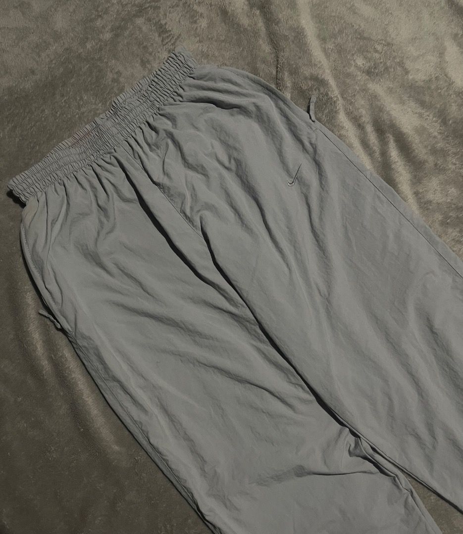 Y2K Vintage Nike Trackpants (Category: Joggers) located in Davao. Submitted by batz11 (Listing ID 1431188259, Image 3). Description: Y2K NIKE TRACKPANTS Condition: Excellent condition Color rate: 10/00 Dimensions: Size 26-36 (free size, with adjustable lace) Length 40 NO ISSUE ❌ DAVAO CITY LOCATION 📌 CAN SHIP THROUGH J&T 📦 DIRECT MESSAGE IF INTERESTED 📥.
