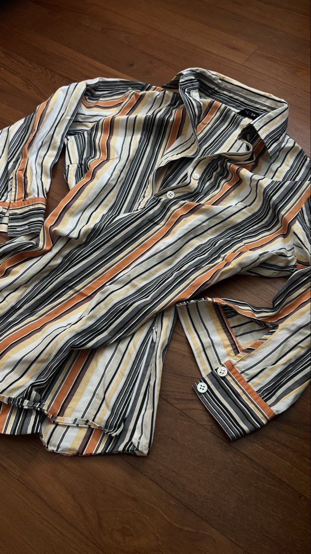 Y2K Vintage Yohji Yamamoto INÉD label Striped Button-Up Shirt (Category: Shirts) located in Singapore. Submitted by aliloulou (Listing ID 1431032800, Image 2). Description: Deadstock Yohji Yamomoto from the INÉD label. Is a quarter button-up shirt and has very office siren styling. Theres a zipper so it cinches the waist when worn and for ease of putting on. open to negos & bundle deals tags y2k, deadstock, weekday, harley davidson, karen millen,