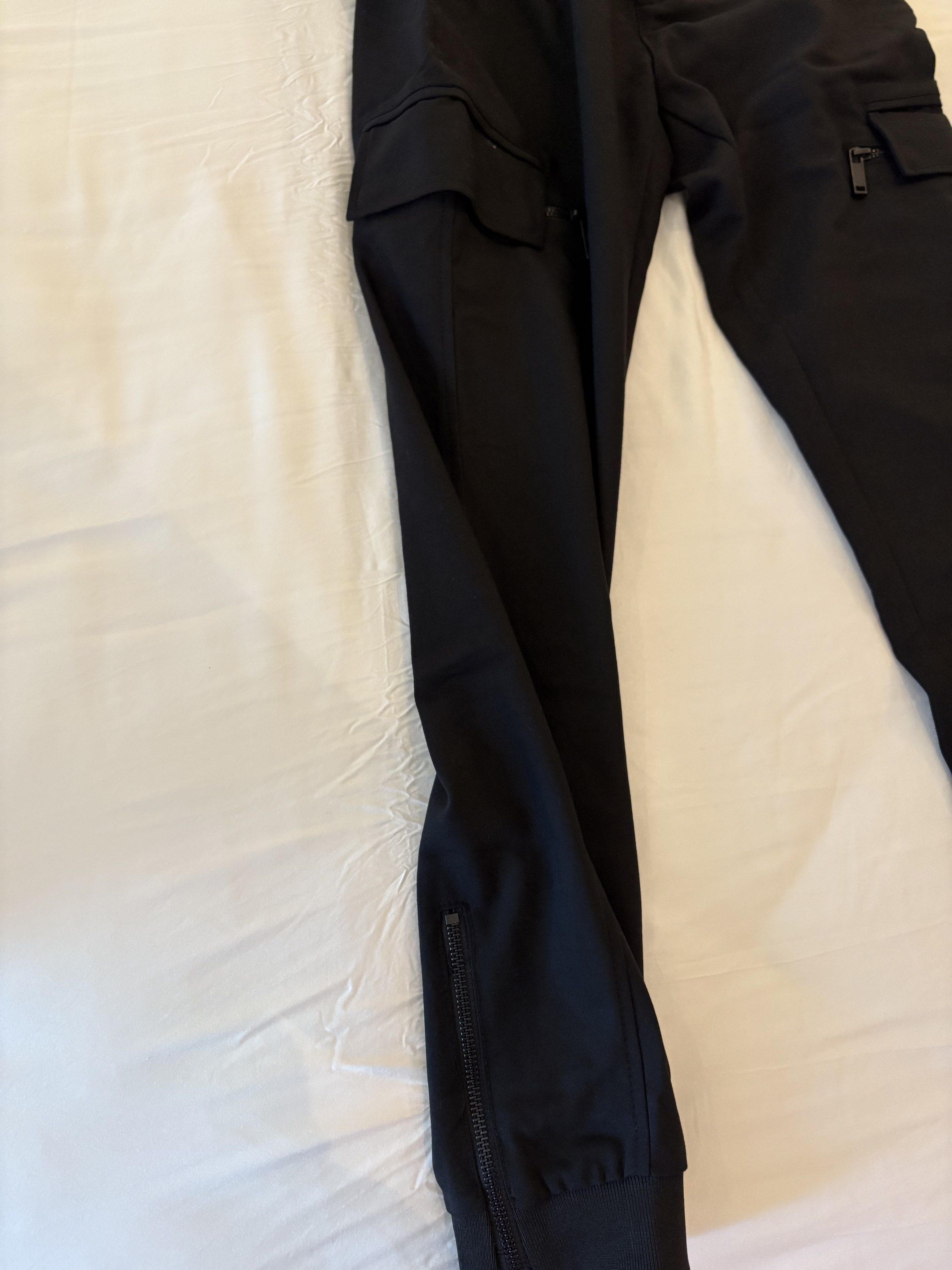 Zara Black Cargo Pants - Size S (Category: Other Bottoms) located in Makati City. Submitted by user7633 (Listing ID 1431252597, Image 3). Description: - Zara black cargo pants - Size: S - Features: - Two cargo pockets with zippers - Zippers at ankles - Elastic waistband - Made in Turkey.