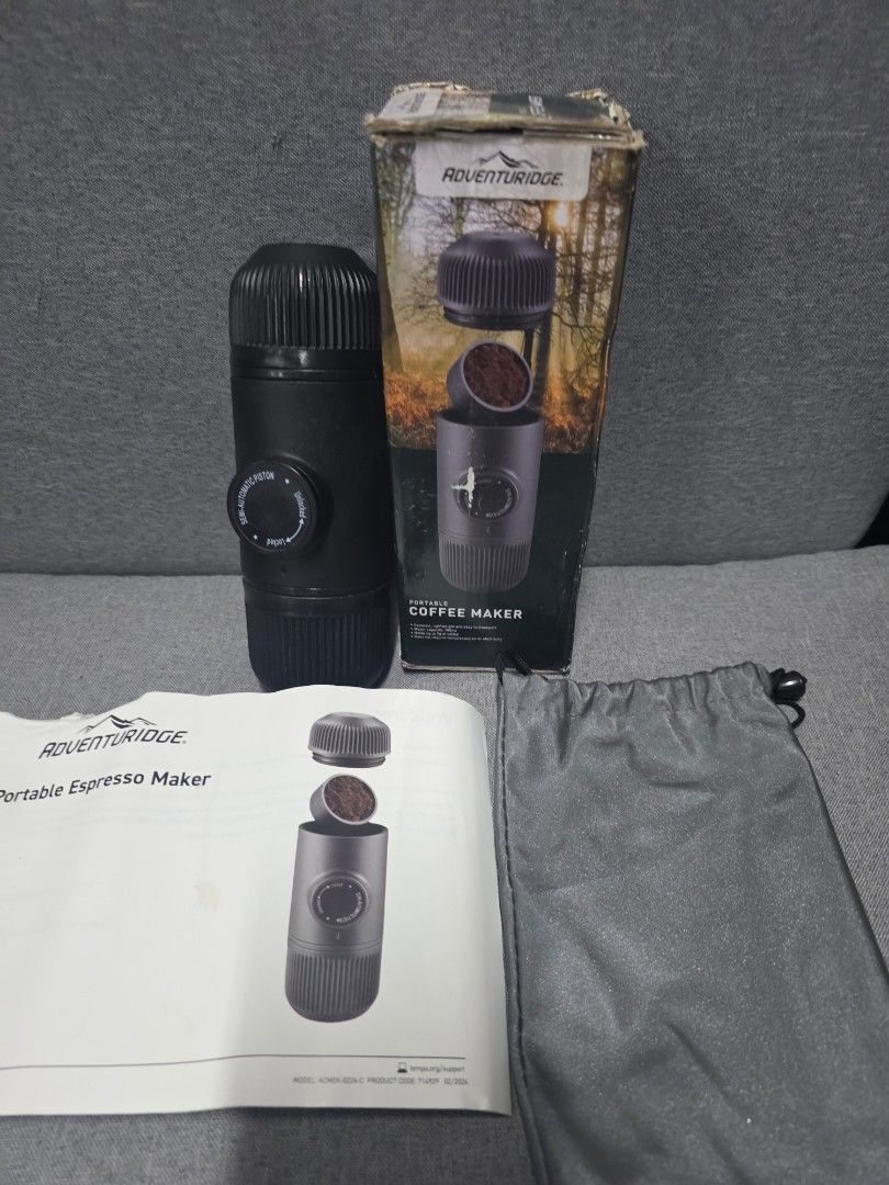 Adventuridge Portable Espresso Maker (Category: Coffee Machines & Makers) located in General Trias. Submitted by roselle2230 (Listing ID 1431478127, Image 1). Description: - Adventuridge portable espresso maker - Includes: coffee maker, original box, user manual, and carrying bag - Color: Black - Ideal for making coffee while traveling.
