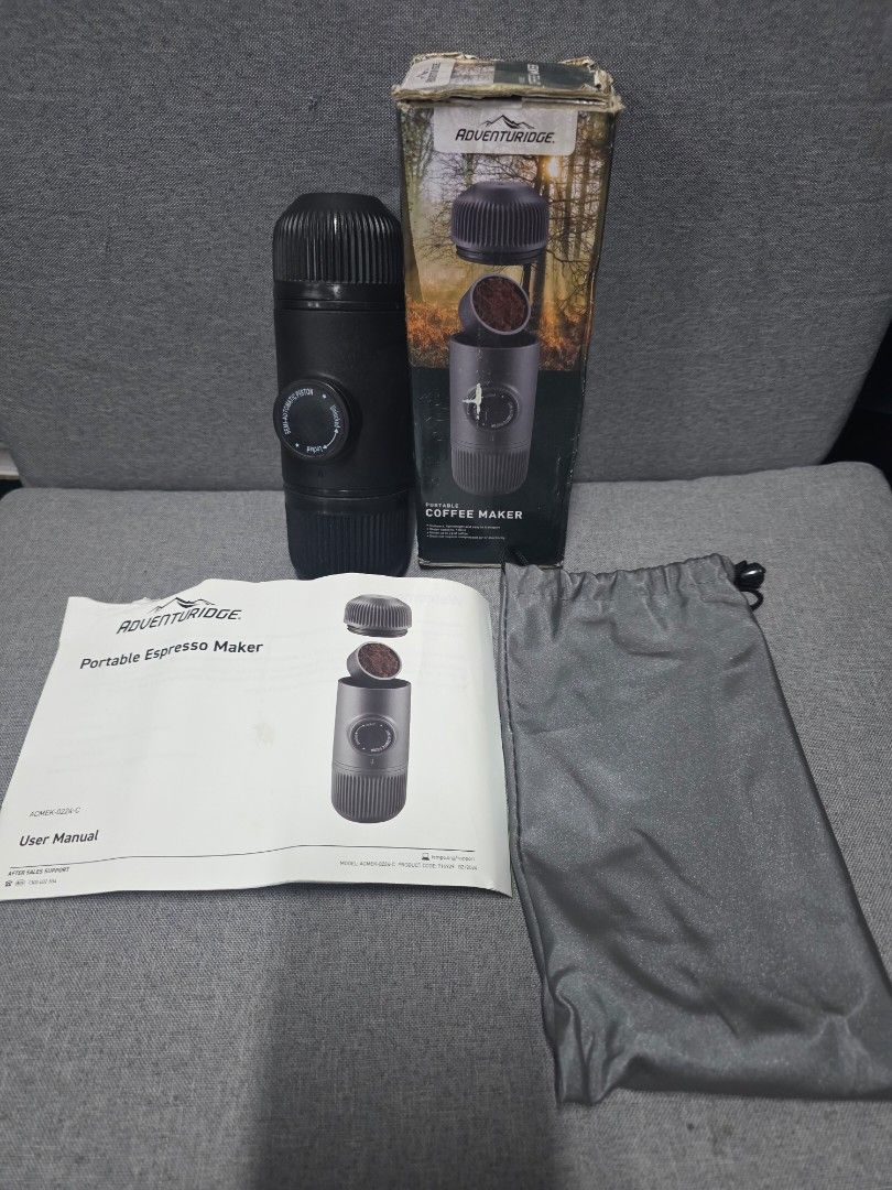 Adventuridge Portable Espresso Maker (Category: Coffee Machines & Makers) located in General Trias. Submitted by roselle2230 (Listing ID 1431478127, Image 2). Description: - Adventuridge portable espresso maker - Includes: coffee maker, original box, user manual, and carrying bag - Color: Black - Ideal for making coffee while traveling.