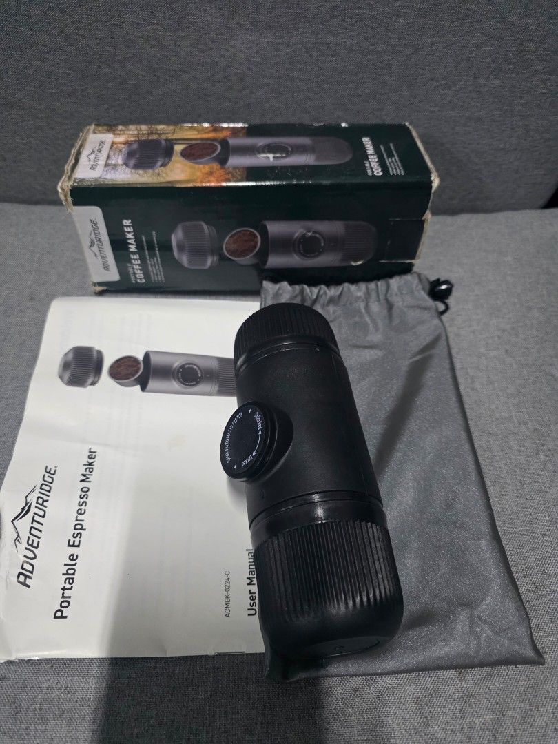 Adventuridge Portable Espresso Maker (Category: Coffee Machines & Makers) located in General Trias. Submitted by roselle2230 (Listing ID 1431478127, Image 3). Description: - Adventuridge portable espresso maker - Includes: coffee maker, original box, user manual, and carrying bag - Color: Black - Ideal for making coffee while traveling.