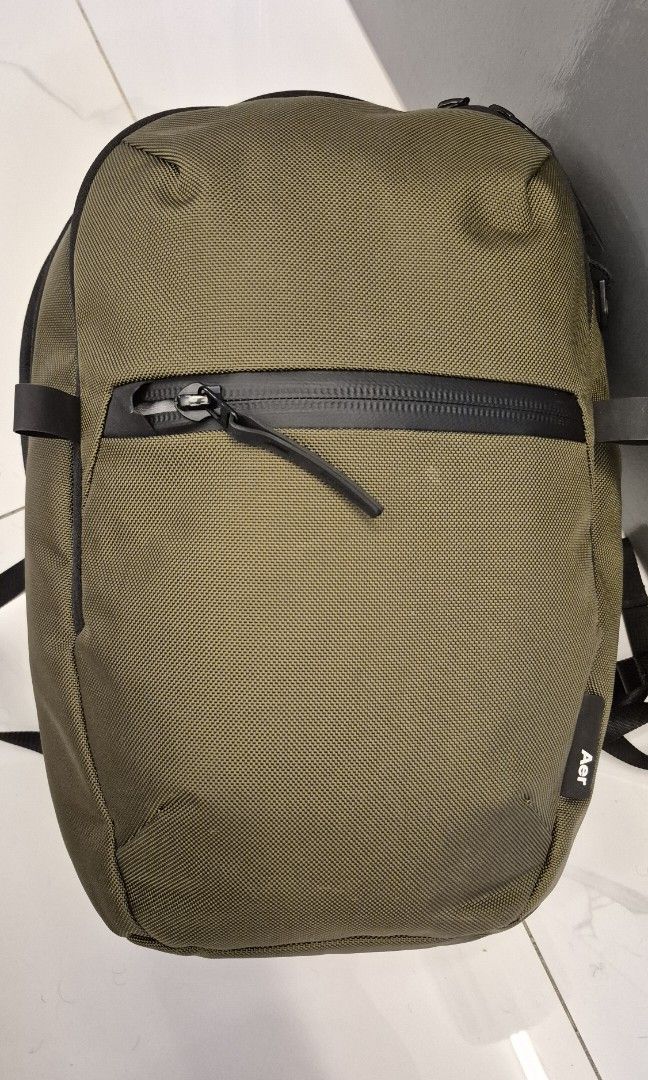 Aer City Pack 2 Olive green (Category: Backpacks) located in Taguig. Submitted by danielbr (Listing ID 1431418316, Image 1). Description: The everyday city backpack The City Pack 2 is the essential everyday backpack designed for the city. It features a smart aesthetic, organization for your everyday gear, and an ergonomic harness system for all-day comfort. Move Smarter™. Product Details Features • 1680D CORDURA® ballistic nylon exterior (bluesig