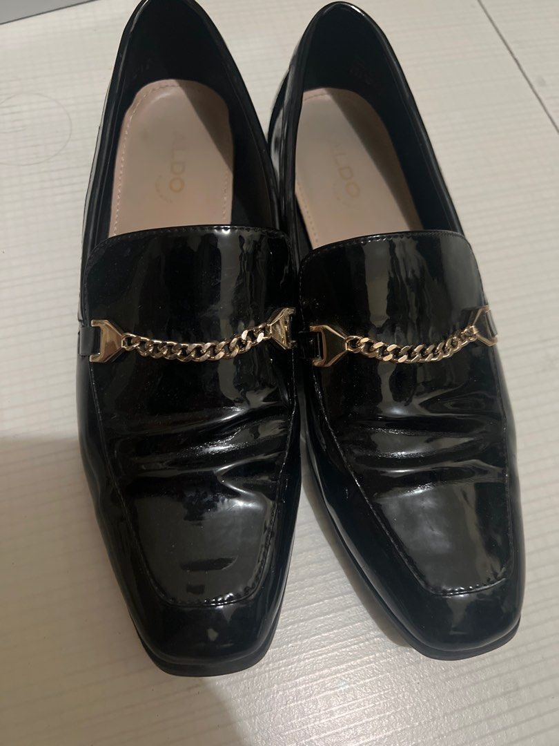 Aldo Black Patent Leather Loafers (Category: Loafers) located in Paranaque City. Submitted by keithil (Listing ID 1431526170, Image 1). Description: - Aldo black patent leather loafers - Gold chain detail - Square toe design - Aldo logo on insole.