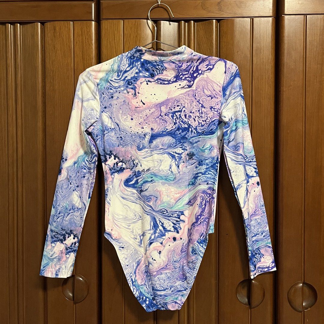 Anko Swim Marble Rashguard Swimsuit (Category: Rash guard) located in Santa Rosa. Submitted by blousa.ph (Listing ID 1431518862, Image 2). Description: Anko Swim Marble Rashguard Swimsuit - Size 12 (fits xs to s) - Eye-catching marble pattern (blue, purple, white) - Long sleeves for sun protection - Convenient zip-up front - Ideal for swimming and beach activities Original from Australia still with tag. .