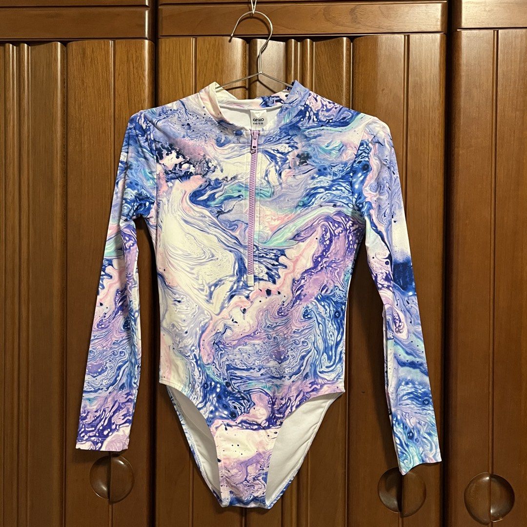 Anko Swim Marble Rashguard Swimsuit (Category: Rash guard) located in Santa Rosa. Submitted by blousa.ph (Listing ID 1431518862, Image 1). Description: Anko Swim Marble Rashguard Swimsuit - Size 12 (fits xs to s) - Eye-catching marble pattern (blue, purple, white) - Long sleeves for sun protection - Convenient zip-up front - Ideal for swimming and beach activities Original from Australia still with tag. .