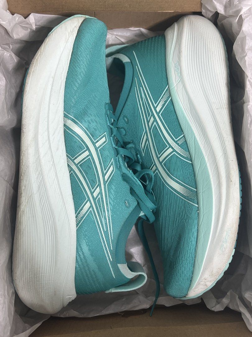Asics Gel Nimbus 27 - Wave Teal (Category: Sneakers) located in Singapore. Submitted by fragmentality (Listing ID 1431520940, Image 1). Description: <30km Men US8.5 Women US10 26.5cm EU42 selling to declutter my shoe collection.