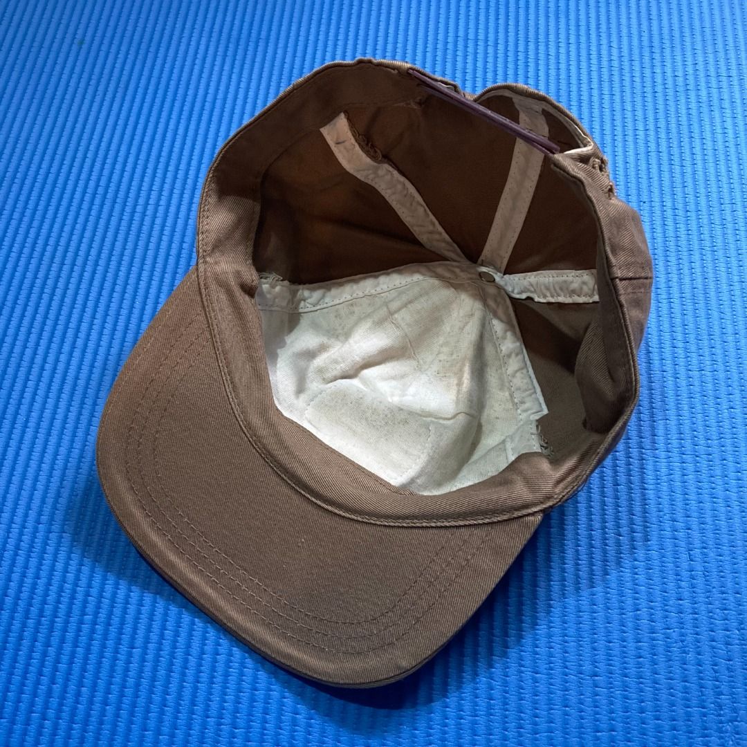 Baseball Cap of Doraemon (Category: Caps & Hats) located in Rizal. Submitted by sensorix___ (Listing ID 1431438889, Image 3). Description: This vintage-style baseball cap features a beige front panel, brown crown and visor, and a circular embroidered patch of the characters Doraemon and Nobita. OSFA - One size fits all if you interested please just hit the message..