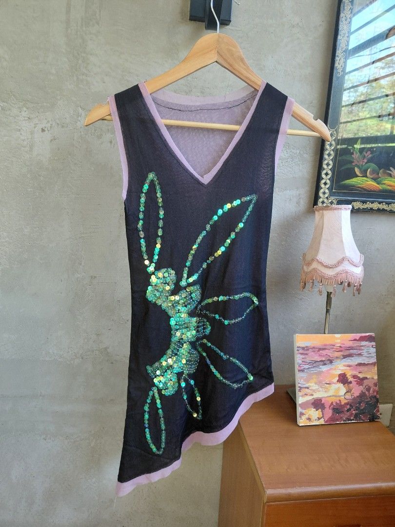 Black Sequin Embellished Top (Category: Sleeveless) located in Koronadal. Submitted by shetries (Listing ID 1431525785, Image 3). Description: S TO M (im M for reference) Trimmed with light purple fabric Asymmetrical hemline Double mesh material No flaws.