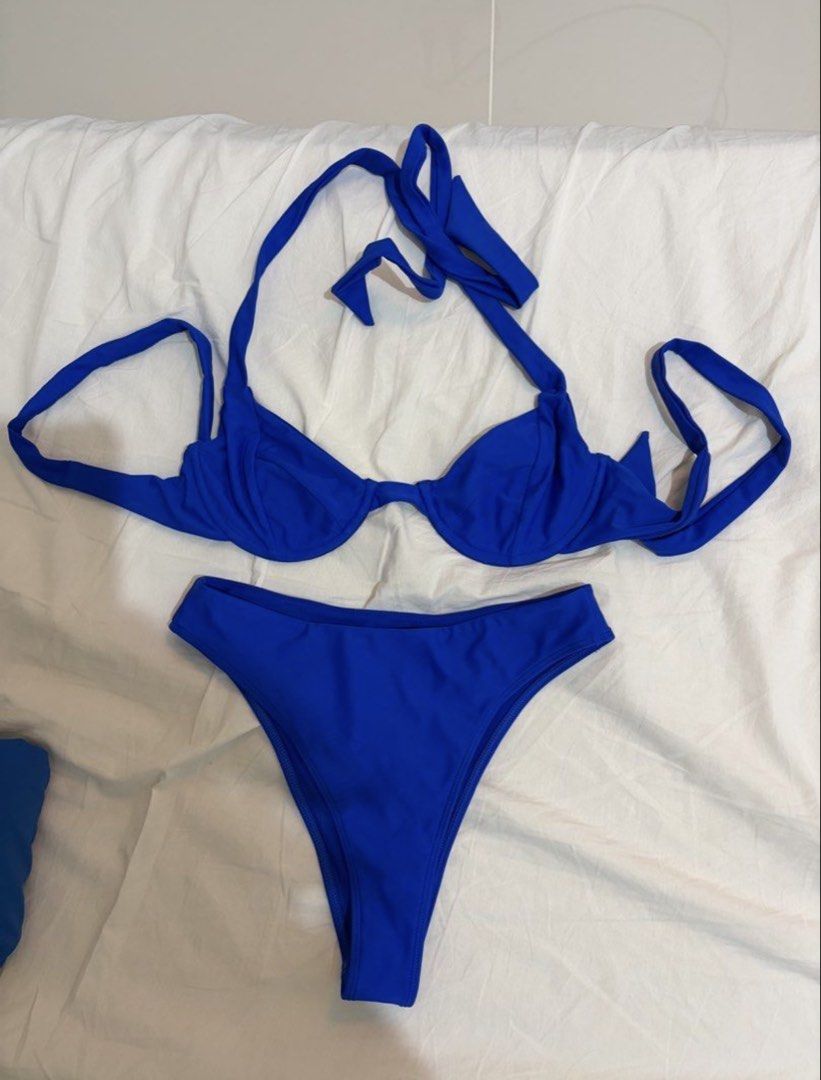 Blackbough Bikini Set - Medium (Category: Bikinis & Swimsuits) located in Angeles City. Submitted by danini__ (Listing ID 1431414947, Image 1). Description: - Blackbough bikini set - Vibrant blue color - Includes top and bottom - Size: Medium - Top style: Halter neck - Designed for swimwear .