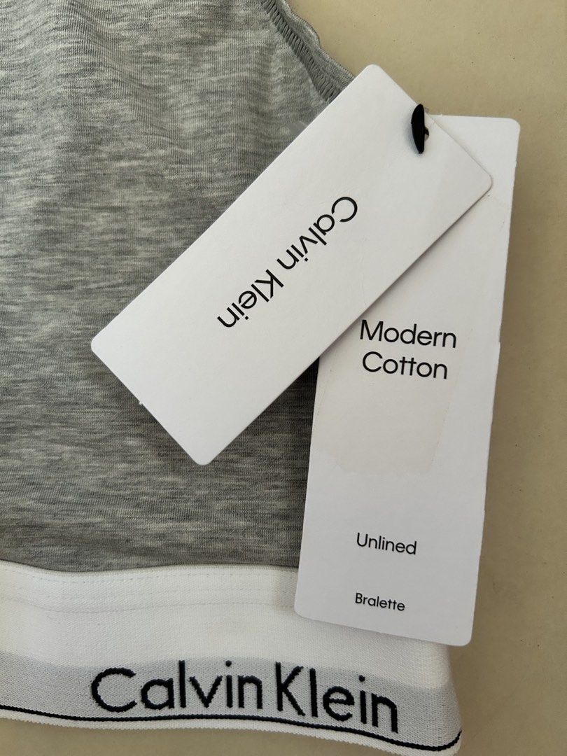 Calvin Klein Modern Cotton Bralette XL (Category: Undergarments & Loungewear) located in Pasig City. Submitted by jrrhs (Listing ID 1431467159, Image 2). Description: - Calvin Klein Modern Cotton bralette - Color: Grey - Size: XL - Features the iconic Calvin Klein logo - Unlined design - Brand new with tags - Original price: $30.