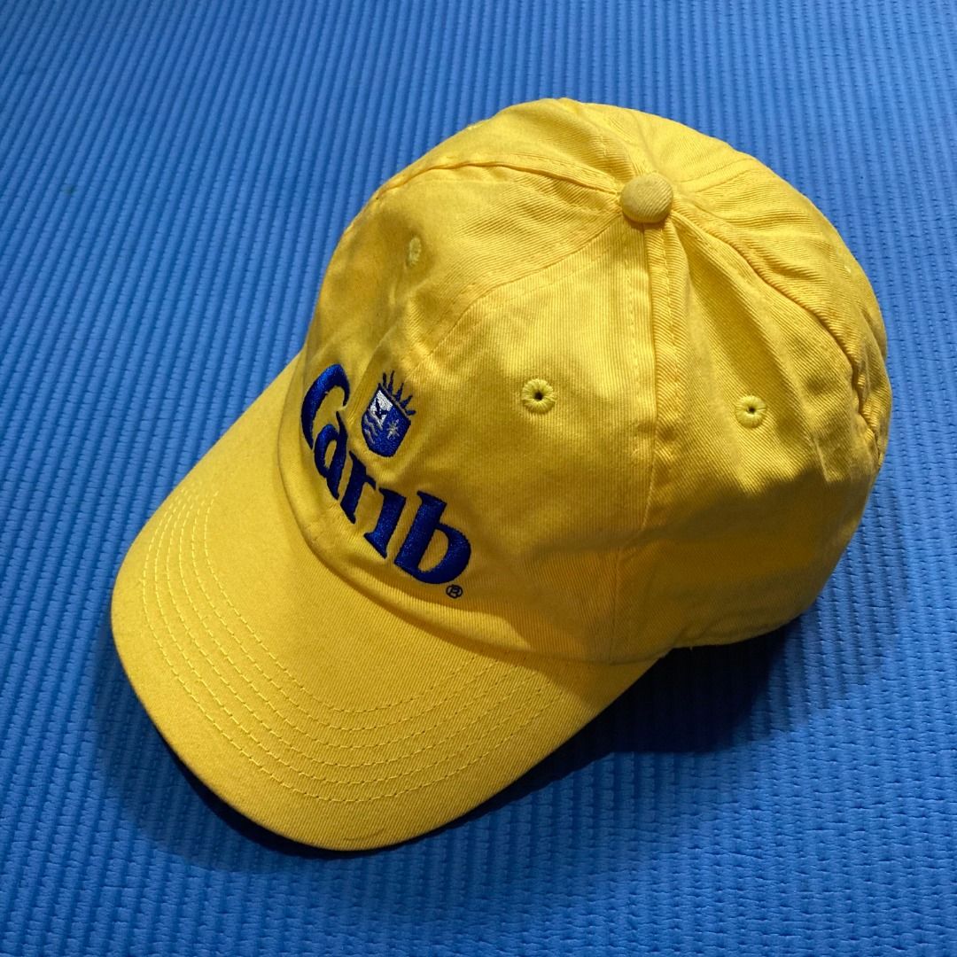Carib Lager beer baseball cap (Category: Caps & Hats) located in Rizal. Submitted by sensorix___ (Listing ID 1431440305, Image 3). Description: This vintage 1990s yellow baseball cap features the embroidered logo for Carib Lager beer OSFA - One size fits all if you interested please just hit the message..