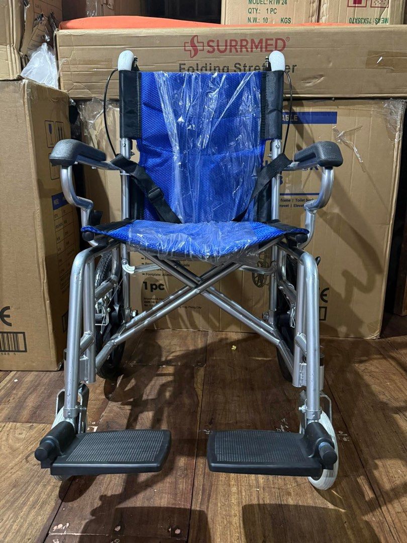 Cart type Travel Wheelchair (Category: Wheelchairs) located in Manila. Submitted by rosel2001 (Listing ID 1431415708, Image 1). Description: - Cart type Travel Wheelchair - Lightweight and foldable design - Features footrests and armrests - Includes a safety strap - Available in blue or black seat - Durable silver frame.
