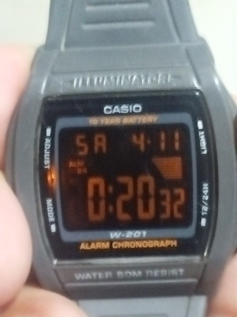 Casio W-201 Digital Watch (Category: Men's Watches) located in Subic. Submitted by regiedaniel01 (Listing ID 1431415662, Image 3). Description: - Casio W-201 digital watch - Gray strap - Features: Alarm, Chronograph, 12/24H display - 10-year battery life - Water-resistant up to 50M - Stainless steel back - Made in Thailand.