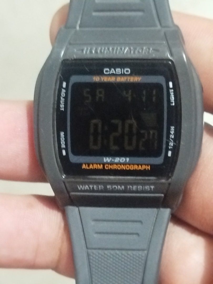 Casio W-201 Digital Watch (Category: Men's Watches) located in Subic. Submitted by regiedaniel01 (Listing ID 1431415662, Image 2). Description: - Casio W-201 digital watch - Gray strap - Features: Alarm, Chronograph, 12/24H display - 10-year battery life - Water-resistant up to 50M - Stainless steel back - Made in Thailand.