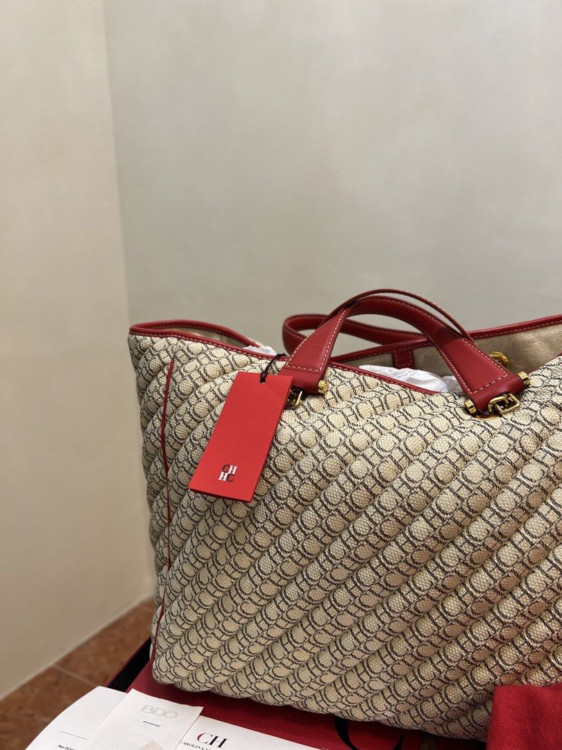 CH Carolina Herrera Monogram Quilted Tote Bag (Category: Luxury Bags & Wallets) located in Muntinlupa City. Submitted by saiki__ (Listing ID 1431545501, Image 2). Description: NEGOTIABLE - Authentic CH Carolina Herrera tote bag purchased in Greenbelt 5 - Beige and red color scheme - Features signature brand pattern - Includes dust bag, box, and tag - Red handles and trim - Gold-colored hardware - Unused condition - With Receipt - Shipping shoulde