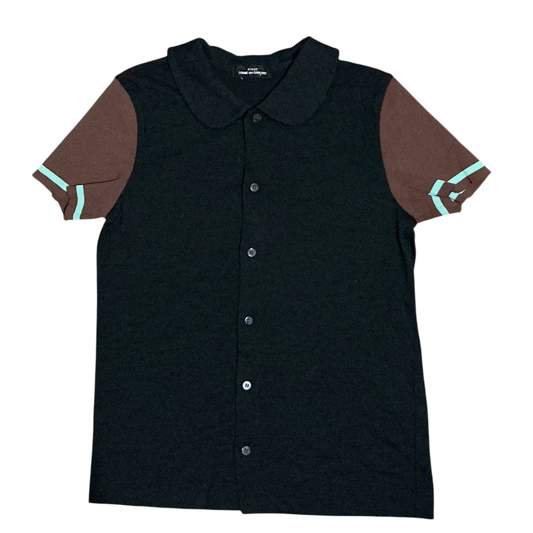 Comme des Garcons Tricot Shirt (Category: Shirts) located in Naga. Submitted by sachi_v2 (Listing ID 1431493677, Image 1). Description: - Comme des Garcons Tricot shirt - Black body with brown sleeves - Unique collar design - Made in Japan - Material: Wool and polyester blend - Button-down style - Classic fit - Adds designer flair.