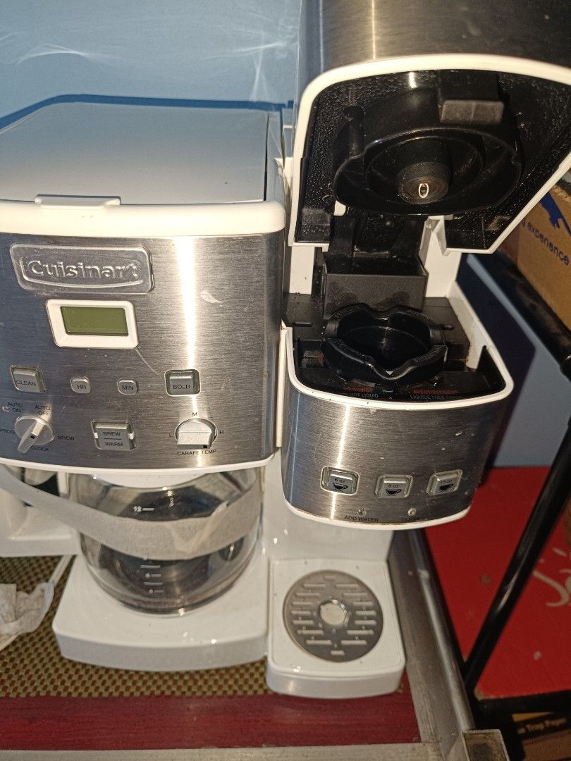 Cuisinart Coffee Maker (Category: Coffee Machines & Makers) located in Pasig City. Submitted by natasha507 (Listing ID 1431540414, Image 3). Description: - Cuisinart coffee maker - 12-cup glass carafe - Dual coffee brewing system - Single-serve side for K-cup pods - Auto-off function - White and stainless steel design -110v.