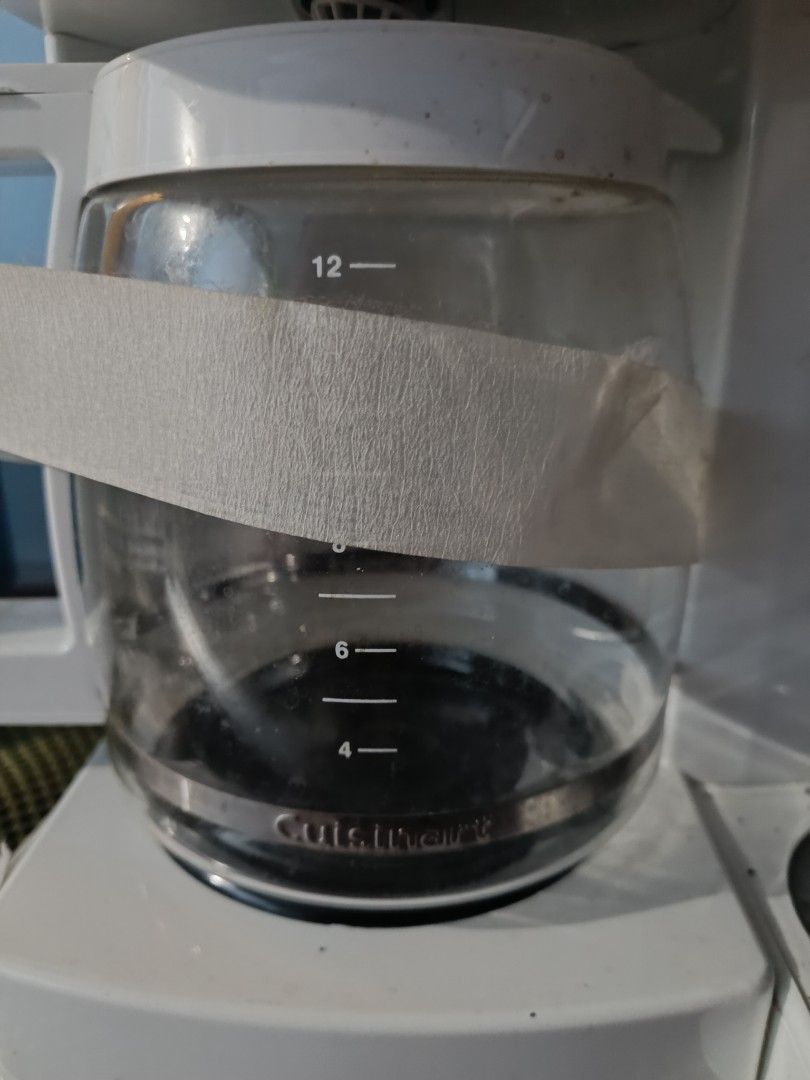 Cuisinart Coffee Maker (Category: Coffee Machines & Makers) located in Pasig City. Submitted by natasha507 (Listing ID 1431540414, Image 2). Description: - Cuisinart coffee maker - 12-cup glass carafe - Dual coffee brewing system - Single-serve side for K-cup pods - Auto-off function - White and stainless steel design -110v.