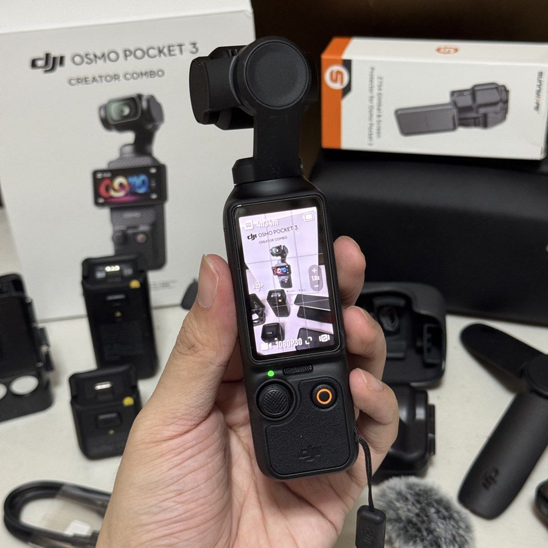 DJI Osmo Pocket 3 Creator Combo (Category: Cameras) located in Marikina City. Submitted by ShanDestashes (Listing ID 1431402370, Image 2). Description: Auto pass to lowballers • Haven’t used outside at all! Bought for the idea of vlogging but I’m still shy around to use it so I decided to just sell it again. • Warranty until November 17, 2026 • With add on ulanzi magnetic case, sunlife gimbal and screen case and screen protector, tempered glass, 