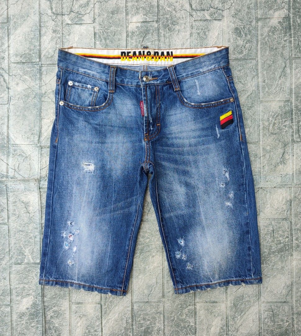 DSQUARED2 Denim Shorts (Category: Shorts) located in Bayambang. Submitted by mon10192816 (Listing ID 1431505302, Image 1). Description: - Waist 30-33 - Lenght 22.5 - DSQUARED2 denim shorts - Distressed design - Size 32 - Button and zipper closure - Classic five-pocket design - Red DSQUARED2 tag - Logo on back pocket - Colorful stripe detail on waistband.