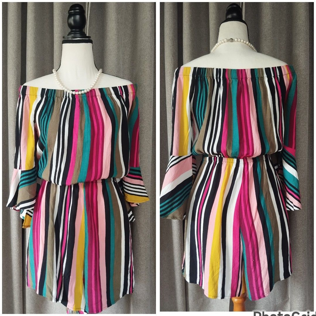 Express Off-Shoulder Striped Dress (Category: Dresses) located in Alicia. Submitted by glambercena (Listing ID 1431469621, Image 1). Description: - Off-shoulder dress - Colorful striped pattern - Size: L - Long, flared sleeves - Elastic waist - Lightweight fabric - Ideal for warm weather - Flattering silhouette - Great for casual or summer events.