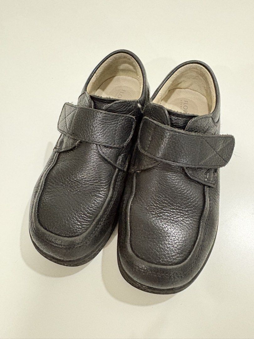 Florsheim Black Leather Shoes (29) (Category: Babies & Kids Fashion) located in Manila. Submitted by analyntorr16083 (Listing ID 1431486270, Image 2). Description: - Florsheim black leather shoes - Hook-and-loop closure - Textured leather upper - Cushioned insole - Rubber soles - Minor signs of wear.