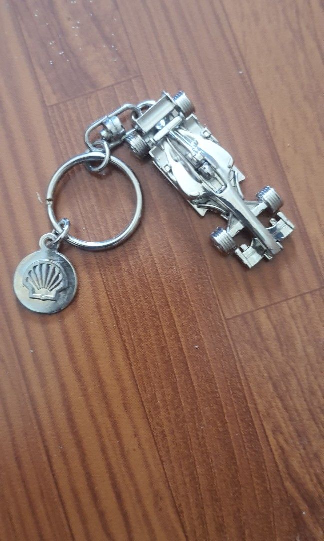 Formula 1 Car Keychain (Category: Vehicle & Diecast Models) located in Caloocan City. Submitted by tonyboyrz (Listing ID 1431524329, Image 3). Description: - Original Shell Ferrai Formula 1 Car Keychain - Features F1 Car Racing design - Includes key ring and Ferrari/Shell logo tag - Made of shiny, metallic material - Great collectible or accessory -Rare 2007 Collectible item -Produce under Ferrari Licensed Product P1,250 or Best Offer Lalamove Pi