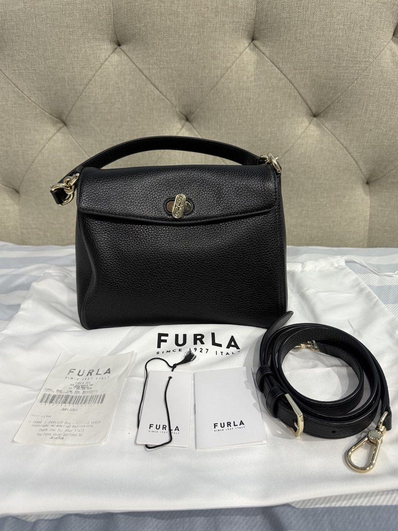 Furla Danae S Shoulder Bag (Black / Nero) (Category: Cross-body Bags) located in San Juan City. Submitted by luxeeditph (Listing ID 1431420879, Image 1). Description: - Two-way bag in grained leather and in excellent condition - Comes with detachable long strap, orig Furla dustbag, receipt and tags - For shipping only via lalamove / grab; booking and SF c/o buyer.