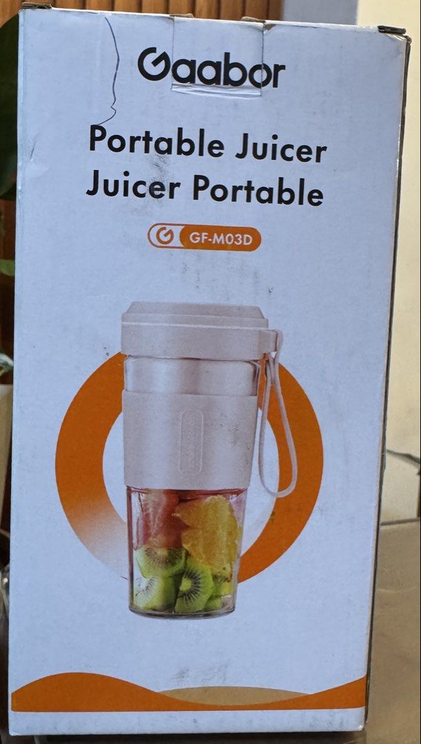 Gaabor Portable Juicer GF-M03D (Category: Juicers, Blenders & Grinders) located in Quezon City. Submitted by kryshnanzyanna (Listing ID 1431533697, Image 1). Description: - Gaabor Portable Juicer - Color: Pink and White - Capacity: 300ml - Cordless design for easy use - Travel-friendly - Includes charging cable - Ideal for making fresh fruit juices ***damaged box.