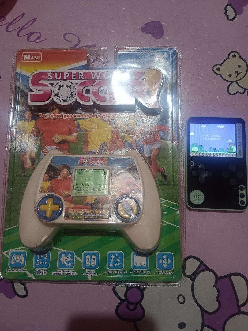 Game console set (Category: Nintendo) located in Pasig City. Submitted by rednaxela_rich (Listing ID 1431406787, Image 1). Description: 2pcs game console set -games power working -super world soccer electronic game handheld battery operated sealed..