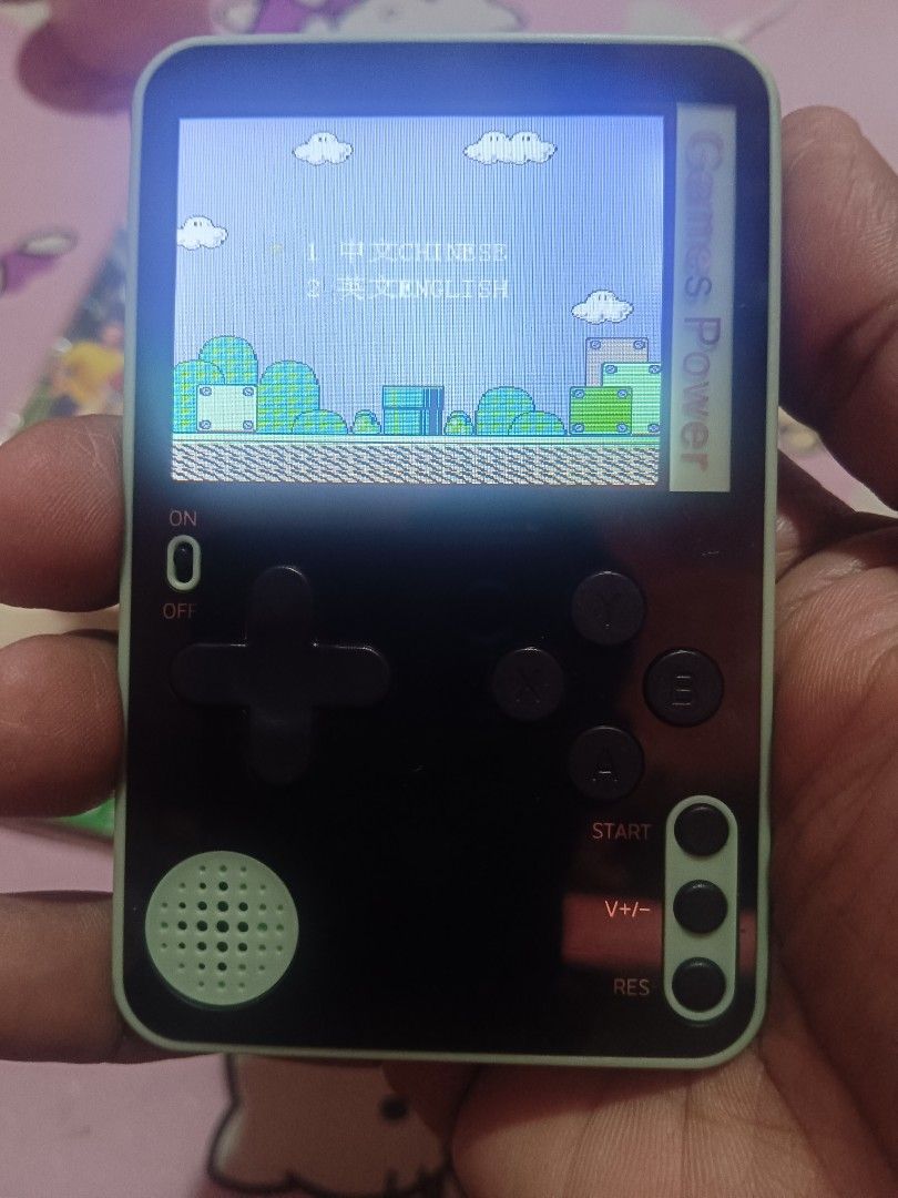 Game console set (Category: Nintendo) located in Pasig City. Submitted by rednaxela_rich (Listing ID 1431406787, Image 2). Description: 2pcs game console set -games power working -super world soccer electronic game handheld battery operated sealed..