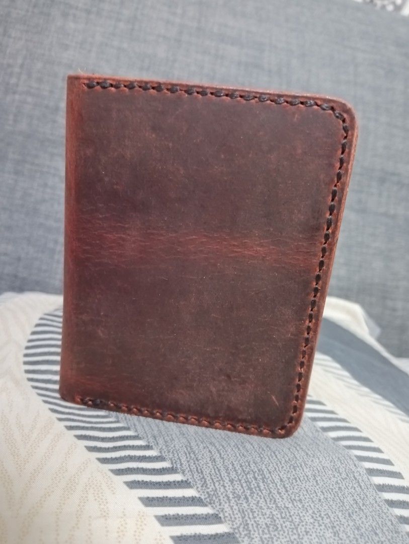 Genuine leather handmade card wallet (Category: Wallets & Card holders) located in Hermosa. Submitted by chic2315 (Listing ID 1431542751, Image 2). Description: Local made and hand made. Made of cow leather. Color dark wine red exterior and brown interior. It has 5 card slots but can fit more cards. Very durable .