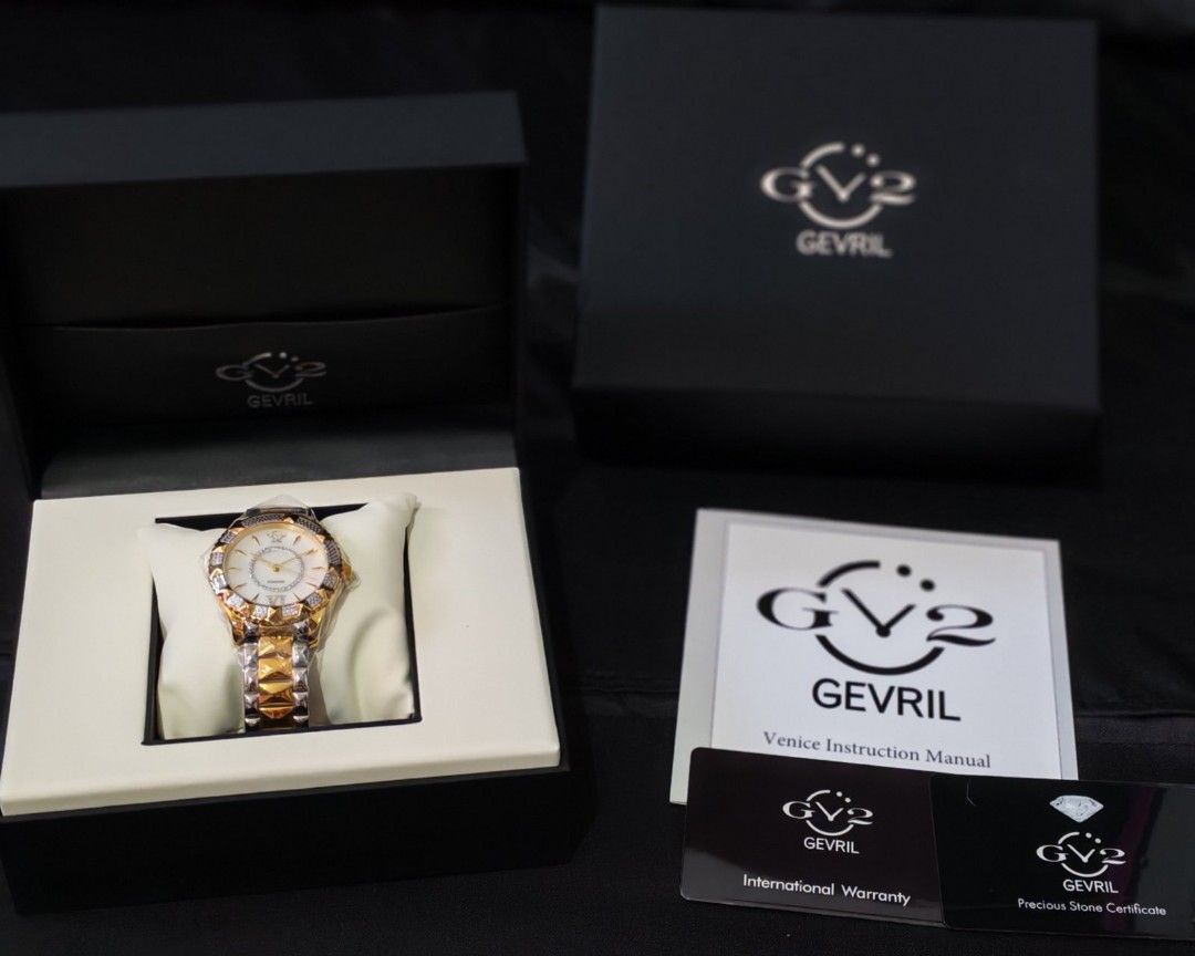 Gevril Venice Diamond Watch (Category: Luxury Watches) located in Manila. Submitted by jewfindshop (Listing ID 1431453418, Image 1). Description: - Gevril Venice watch - Diamond-studded bezel and dial - Two-tone gold and silver bracelet - Includes original box, instruction manual, and warranty cards - White dial with gold accents - Roman numeral hour markers - Clasp visible in images.