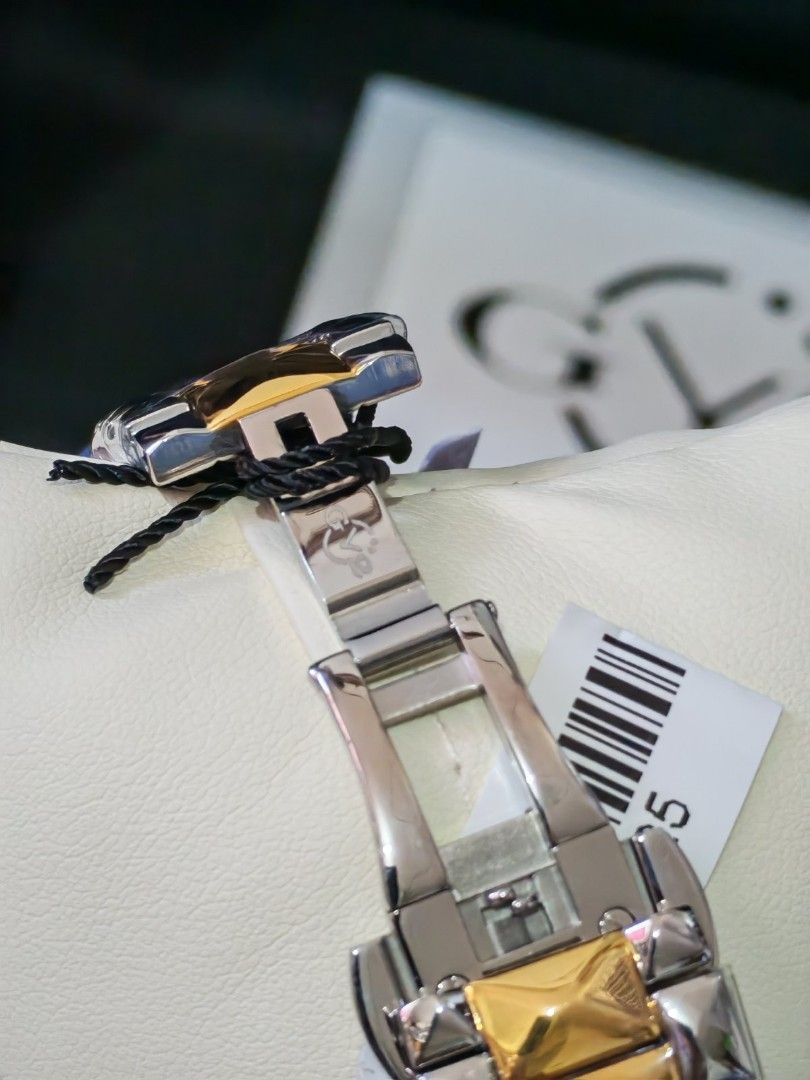 Gevril Venice Diamond Watch (Category: Luxury Watches) located in Manila. Submitted by jewfindshop (Listing ID 1431453418, Image 3). Description: - Gevril Venice watch - Diamond-studded bezel and dial - Two-tone gold and silver bracelet - Includes original box, instruction manual, and warranty cards - White dial with gold accents - Roman numeral hour markers - Clasp visible in images.