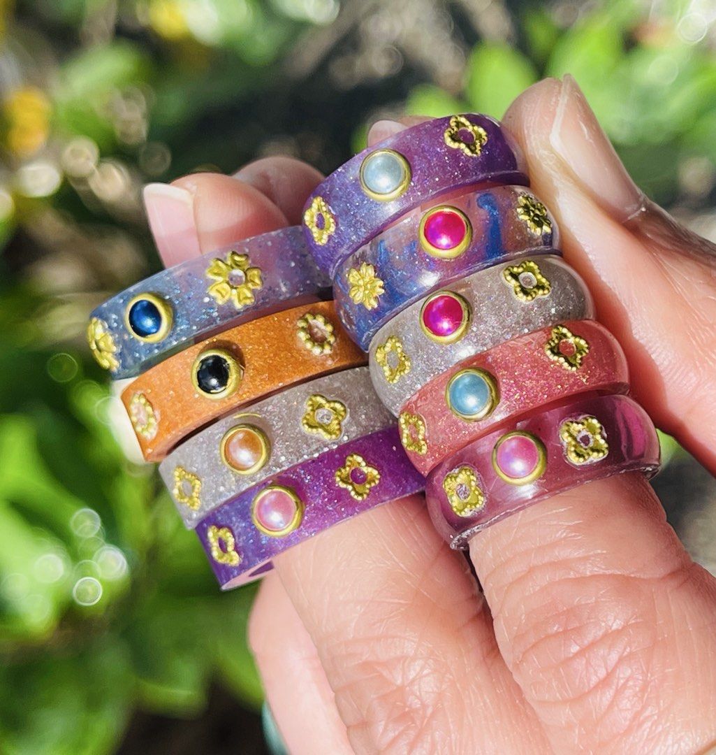 Ghibli design couples ring handmade resin size 7&5 (Category: Rings) located in Muntinlupa City. Submitted by alabangbargains (Listing ID 1431469756, Image 3). Description: watch item video here: https://youtube.com/shorts/B_OuO2sVqYU?si=QHb4uMDvbVvOqT3f material: resin handmade own design size: 7 & 5 color: pink&bronze, silver&violet sold as pair (last two pairs avail mot same color per pair) 💳 Mode of Payment • GCash • Bank Transfer.