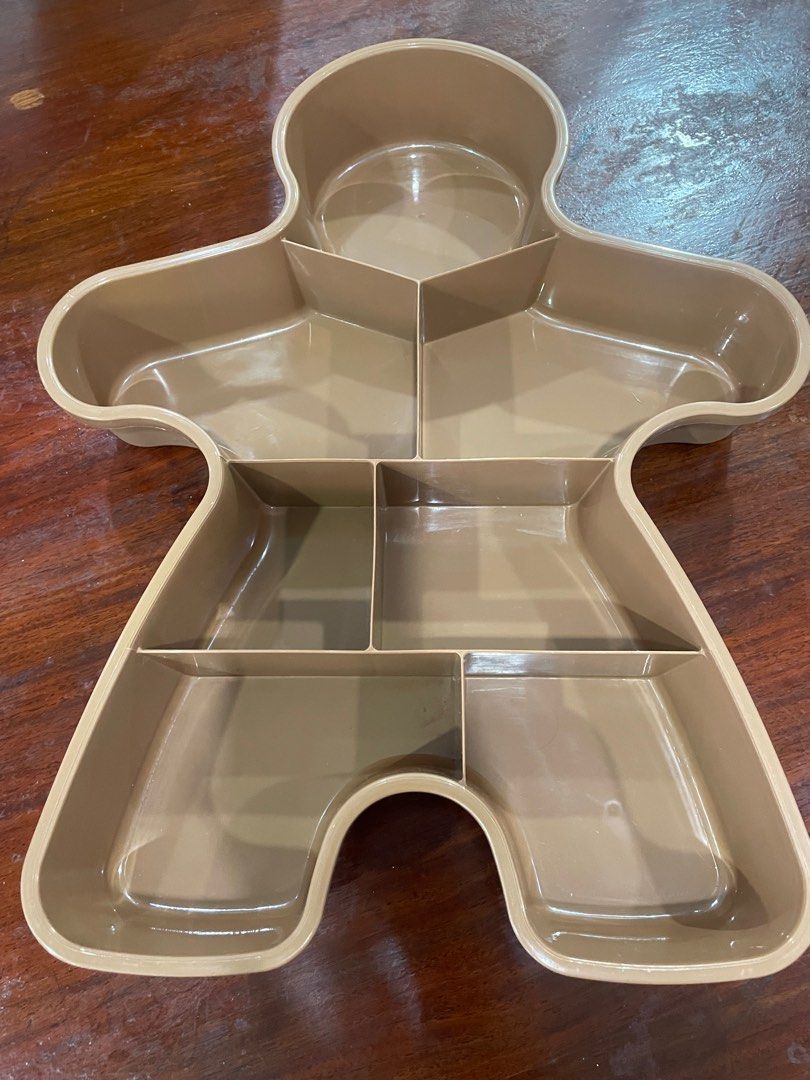 Giant vintage ginger bread man cookie container (Category: Food Organization & Storage) located in Quezon City. Submitted by jthbusiness (Listing ID 1431567425, Image 2). Description: 18x 14 inches Height 2.5 inches Issue: third photo Shipping c/o buyer.