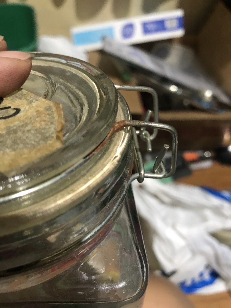 Glass jar (Category: Food Organization & Storage) located in Pasig City. Submitted by papotzy (Listing ID 1431546831, Image 3). Description: - Glass jar with grape design - Features a secure clasp closure - Perfect for food organization and storage Nakatago nalang di na nagamit.