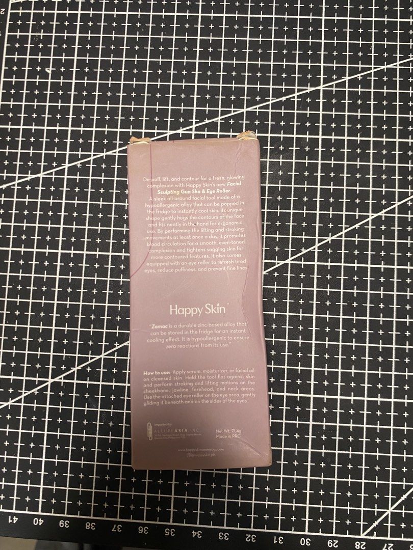 Happy Skin Gua Sha & Eye Roller (Category: Face Care) located in Baguio. Submitted by thriftcornerbygelle (Listing ID 1431413241, Image 2). Description: - Used less than 5 times - Lady Owned - Happy Skin Facial Sculpting Gua Sha & Eye Roller - Designed to de-puff, lift, and contour the face. - Made of durable, hypoallergenic Zamac alloy. - Use with serum, moisturizer, or facial oil. - Gently use the eye roller around the eye area..