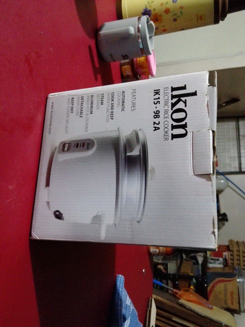 Ikon Electric Rice Cooker IK15-98 2A (Category: Cookers) located in Manila. Submitted by pat_buynsell_declutter (Listing ID 1431549901, Image 1). Description: - Ikon electric rice cooker - Automatic cooking and keep warm functions - Detachable steam vent - Non-stick inner pot - Includes: Glass lid, power cord, and user manual - Color: White with silver inner pot - Model: IK15-98 2A.