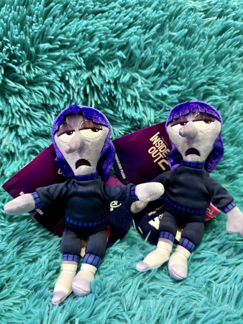 Inside Out Sadness Plush Toy (Category: Plushies & Soft Toys) located in Cebu City. Submitted by jessacelo30916 (Listing ID 1431537565, Image 1). Description: - per pcs - Two Sadness plush toys from Inside Out - Wearing blue outfits - Includes white socks and purple shoes - Features blue hair and a sad expression - Set against a teal background - Great for collectors and fans!.
