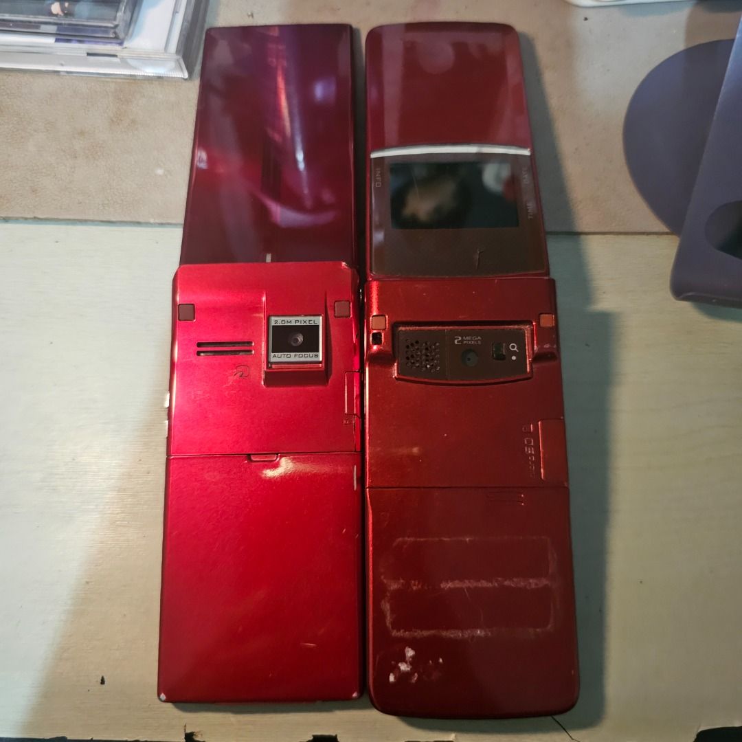 Japanese Phone as is (Category: Early Generation Mobile Phones) located in Quezon City. Submitted by ame_1234 (Listing ID 1431484075, Image 3). Description: - Japanese flip phones - Red color - Classic clamshell design - Features a 2MP camera - Japanese keypad - Unique and collectible As is. No charger. Can be tested..
