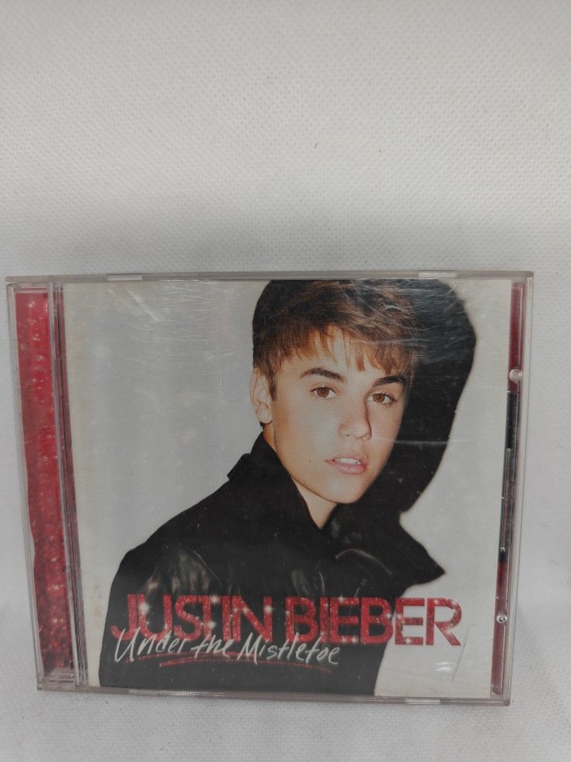JUSTIN BIEBER- UNDER THE MISTLETOE (Category: CDs & DVDs) located in Manila. Submitted by musiccdshopnew (Listing ID 1431427519, Image 1). Description: .
