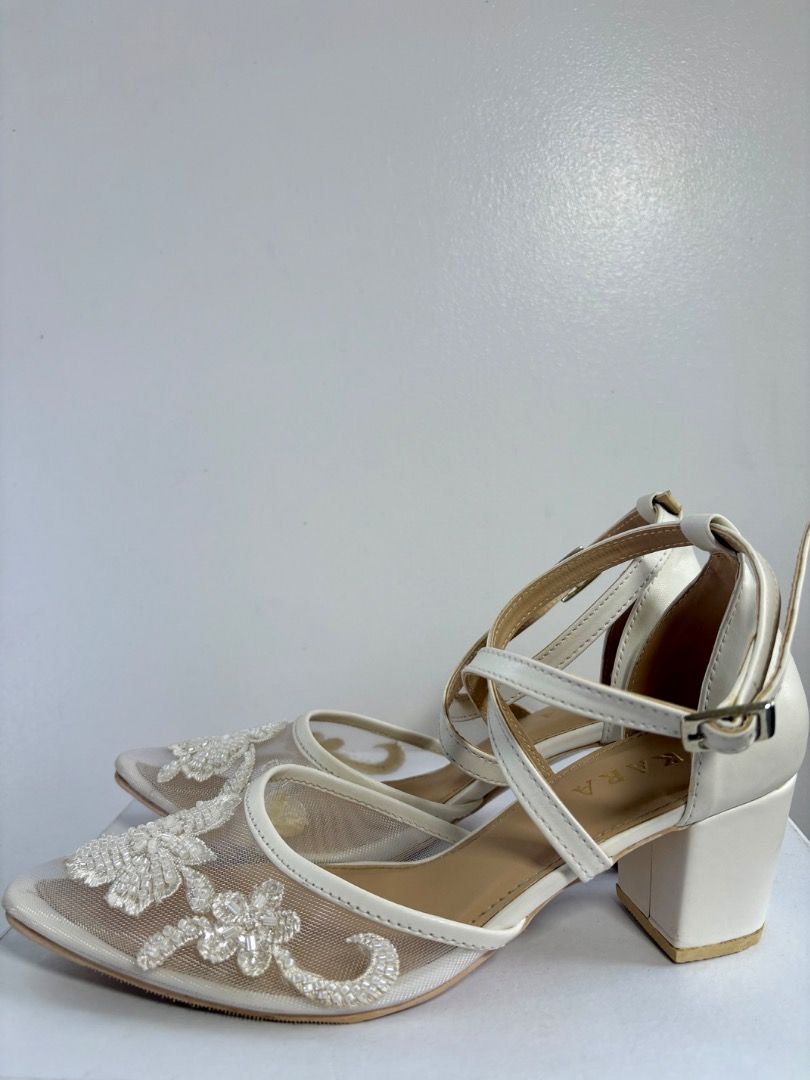 Kara wedding shoes (Category: Heels) located in Amadeo. Submitted by miyaval (Listing ID 1431450963, Image 3). Description: Wedding shoes by Kara Zapatos Bridal -Ivory white -3D floral lace appliques -Size 6 -2” block heels -Used during wedding ceremony Mode of Payment: BDO, BPI, GCash Location: Amadeo, Cavite.